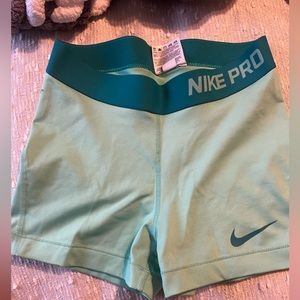 mint / green nike pros size small